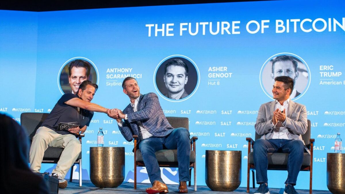 SkyBridge Capital founder Anthony Scaramucci (left) with Eric Trump (middle) and Asher Genoot, chairman of American Bitcoin.
