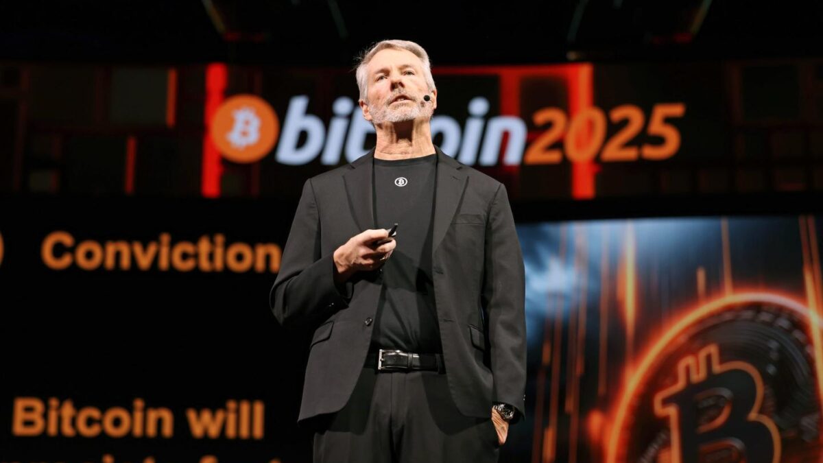 Michael Saylor on stage at a Bitcoin conference.