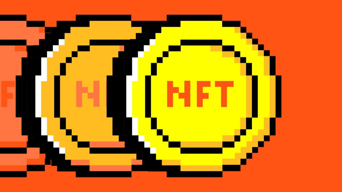 A picture of three gold coins with the term NFT inscribed on them.