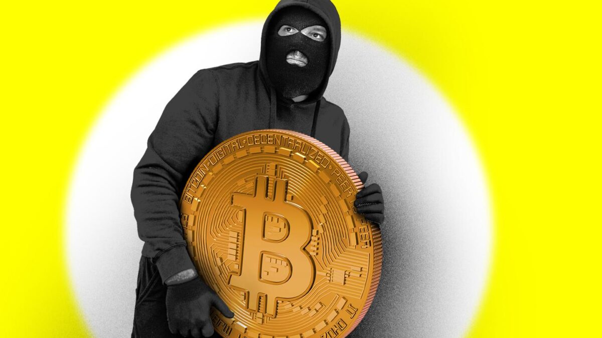 One man; male criminal dressed all in black; carrying stolen Bitcoin