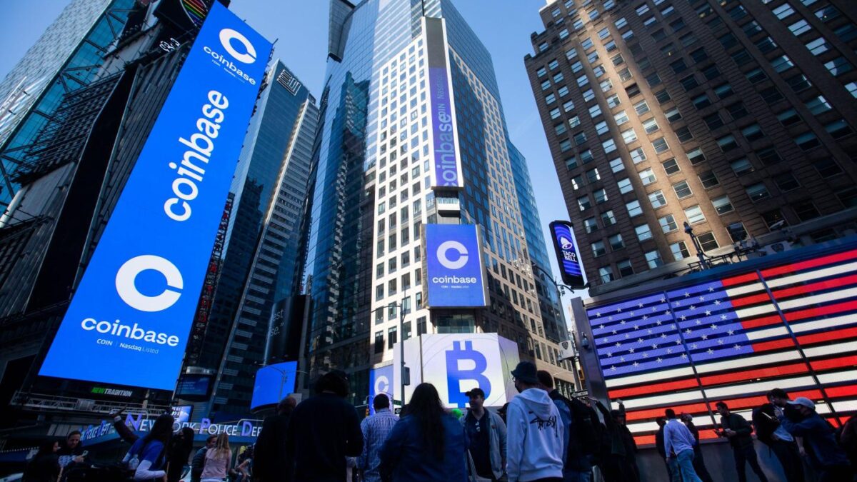 Coinbase employees in Times Square when the firm was first listed on the NASDAQ in April 2021.
