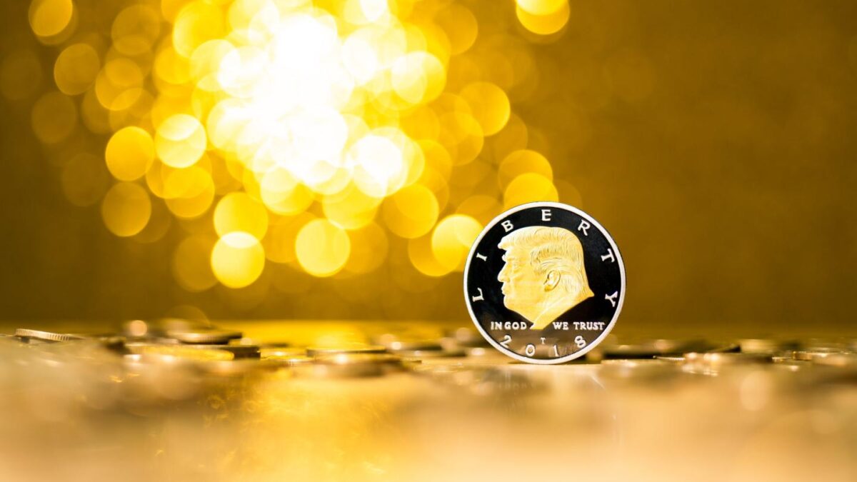 Illustration of a coin with Donald Trump's image on it