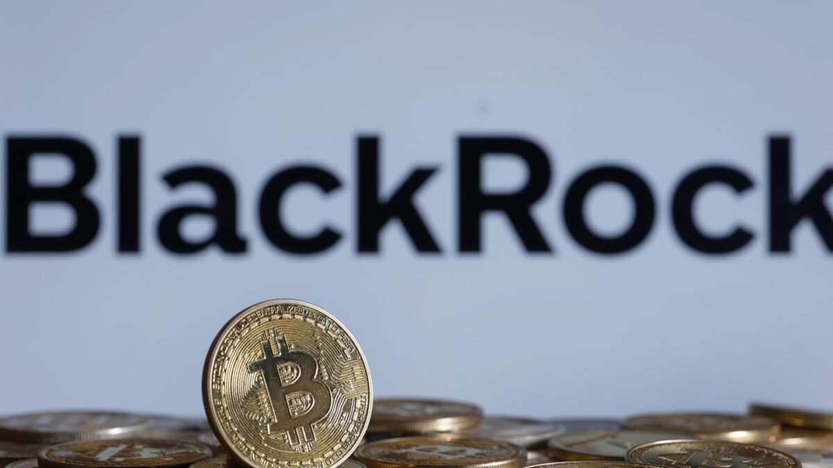 Gold coin with Bitcoin symbol in front of BlackRock logo