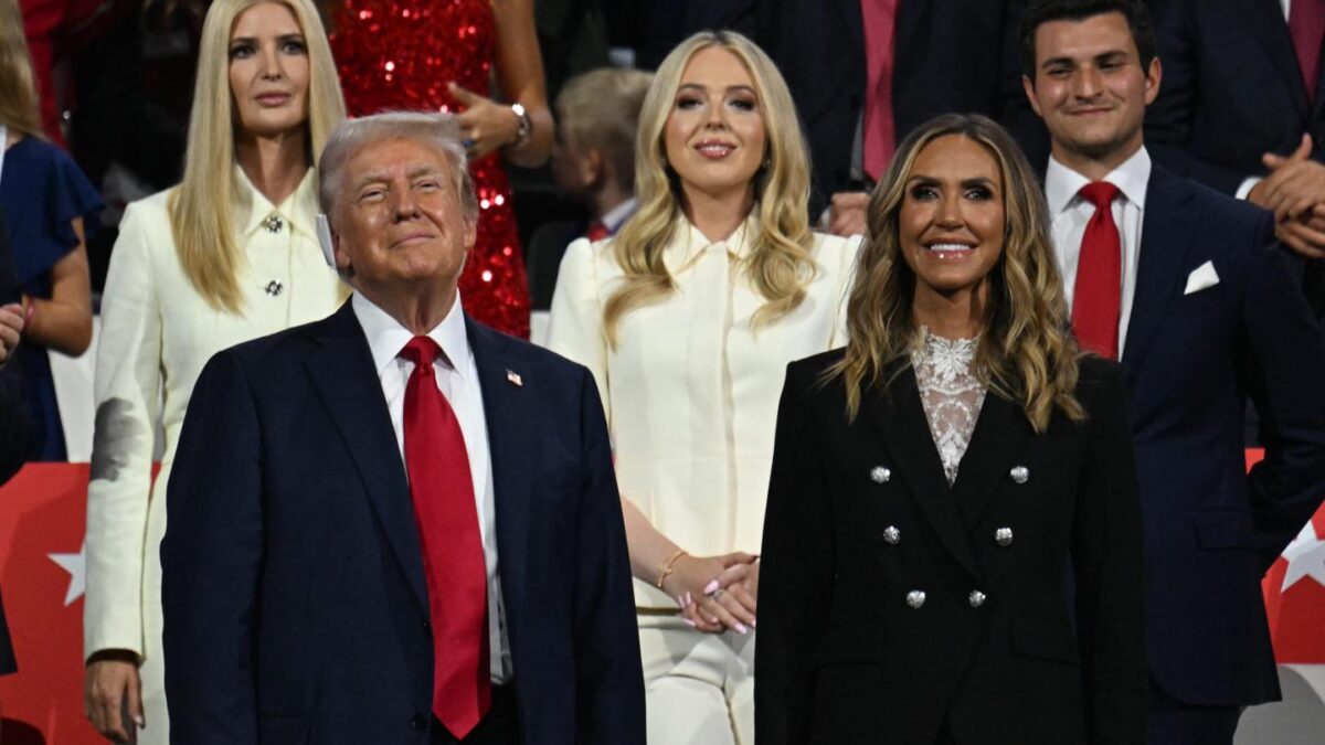 U.S. former President and 2024 Republican presidential candidate Donald Trump (L) stands with Co-chair of the Republican National Committee Lara Trump (R), (from top L) daughter Ivanka Trump, daughter Tiffany Trump and her husband Michael Boulos, during the last day of the 2024 Republican National Convention.