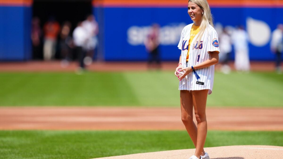 Haliey Welch throws out the first pitch at an MLB baseball game at Citi Field in New York City.