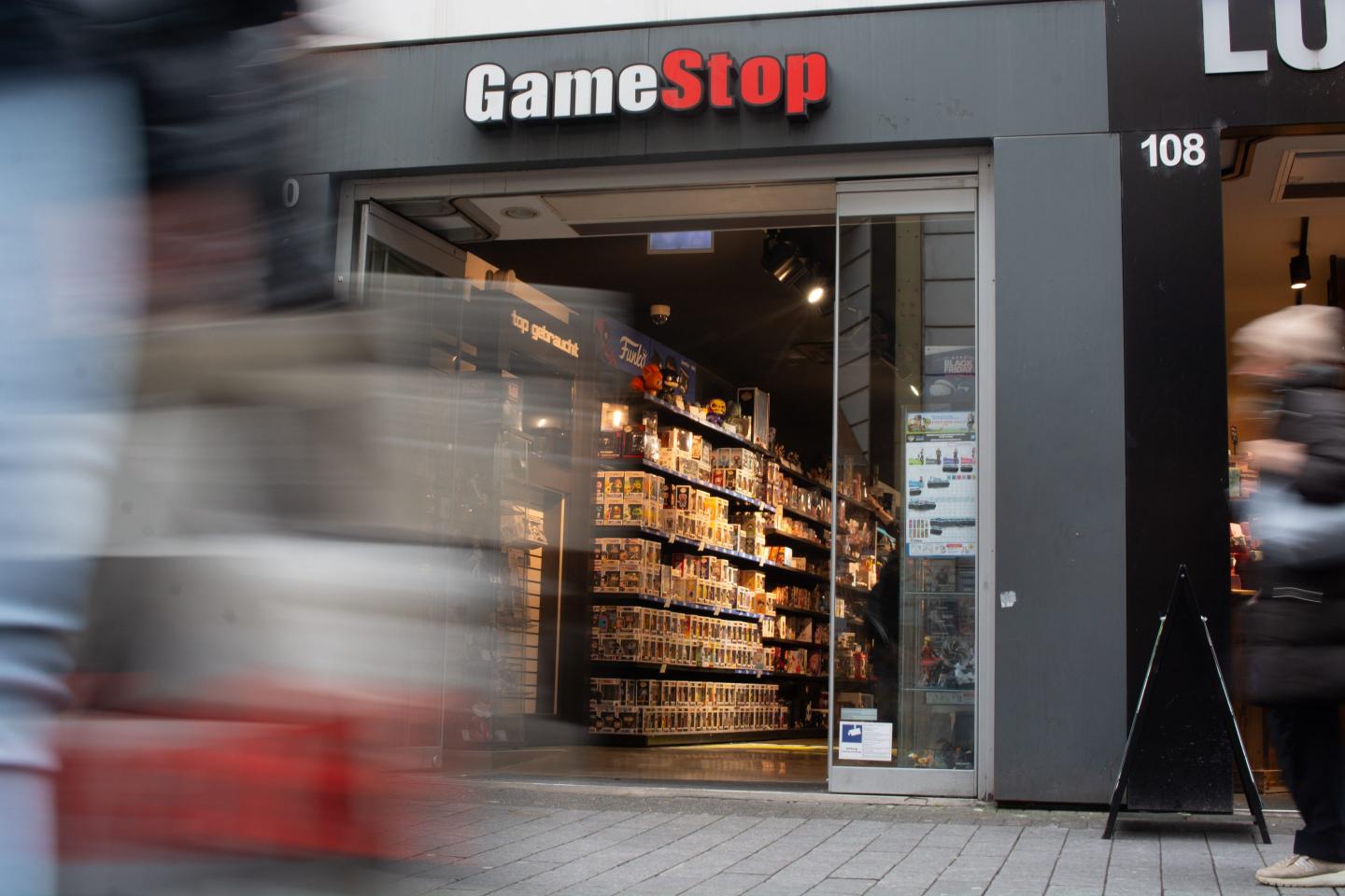 Gamestop shares fell double digits after announcing $1.3 billion Bitcoin purchases.