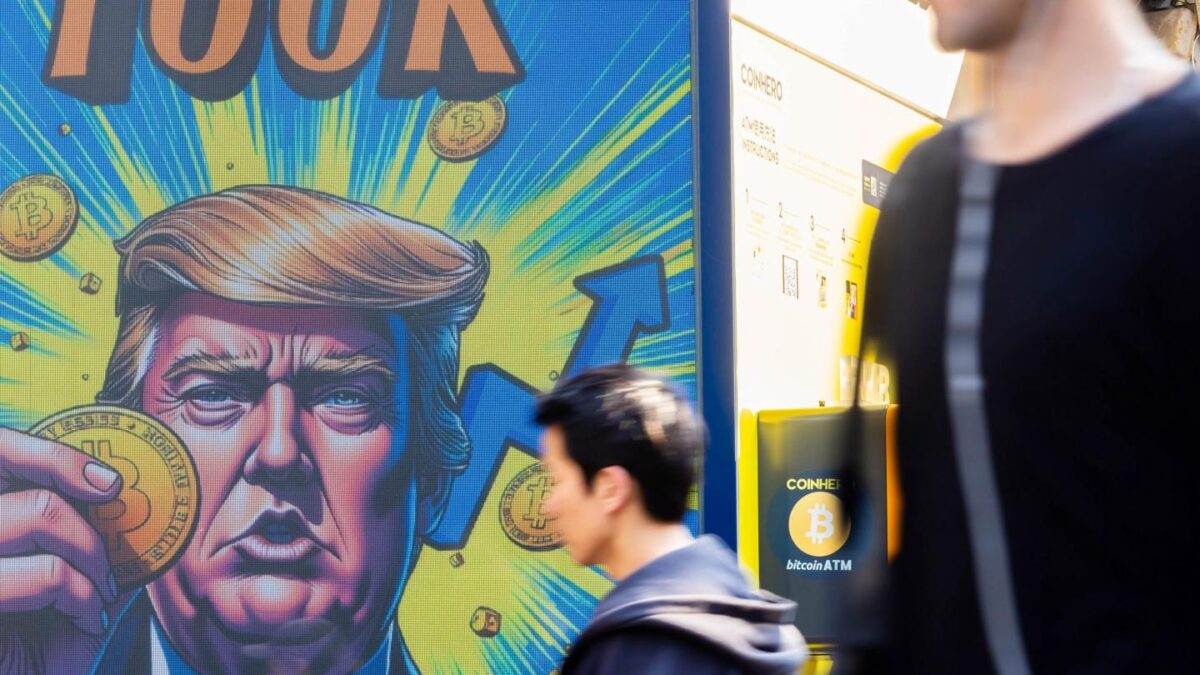 A cartoon image of Donald Trump holding a Bitcoin token to mark Bitcoin reaching over $100,000.