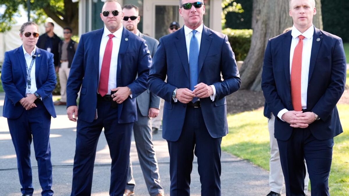 Secret Service Director Sean Curran, second from right, looks on as President Donald Trump and first lady Melania Trump attend an Independence Day military family picnic on the South Lawn of the White House on Friday.