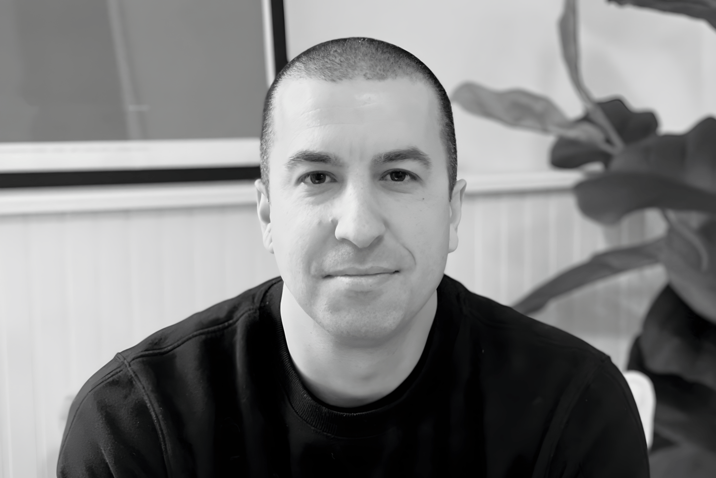 A headshot of Ryan Bozarth